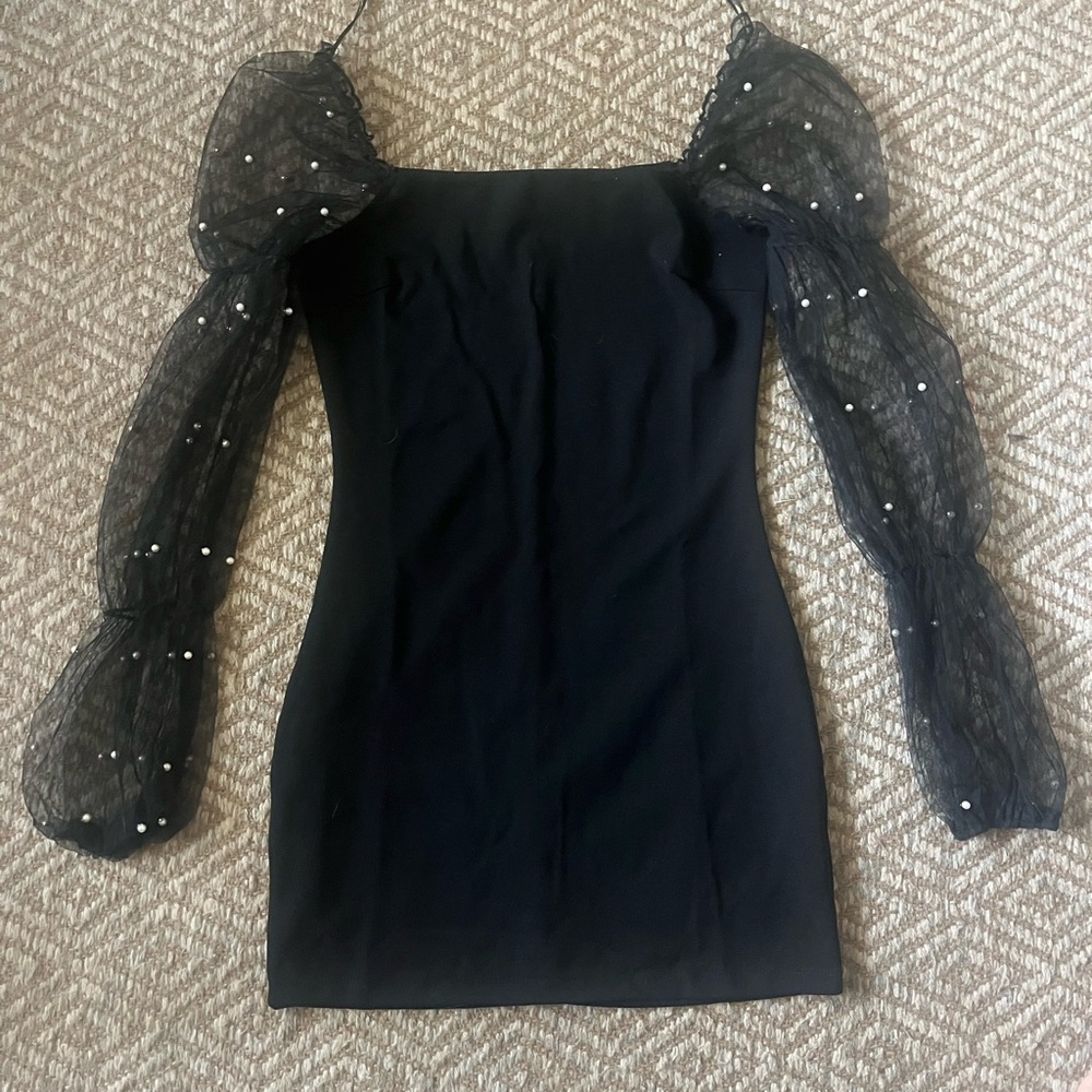 Black mini dress, pearl sleeves